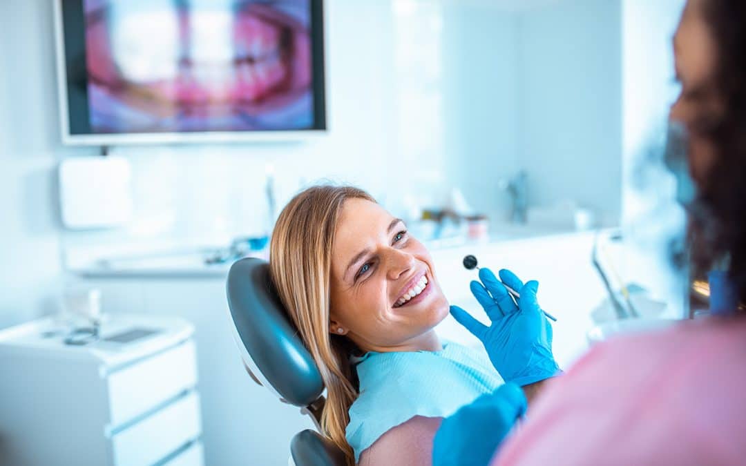 Woman beginning laser treatment for dental cavities in Salem, NH